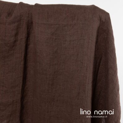Rudas lininis audinys retesnio pynimo vertikaliomis juostelėmis