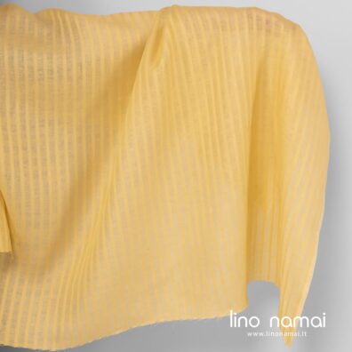 Geltonas lininis audinys ažūrinėmis juostelėmis