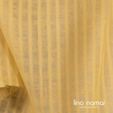Geltonas lino audinys austas juostelėmis