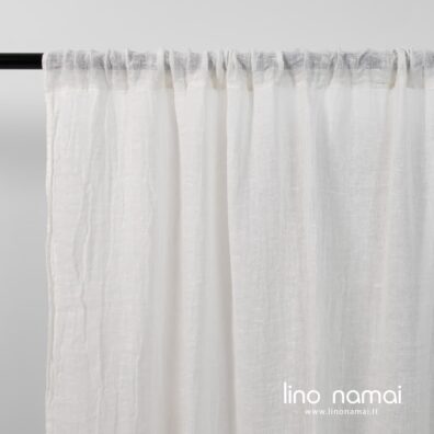 Balta skalbto lino užuolaida su kanalu karnizui