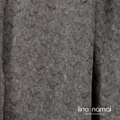 Minkštas švelnus skalbtas gelsvai juodas lino audinys su rombais