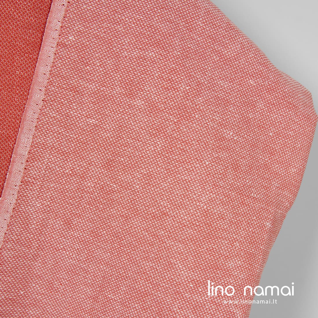 Lino-medvilnės audinys rombų raštu iš raudonų ir baltų verpalų