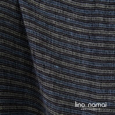 „Vaflinis“ lino audinys iš juodų, mėlynų ir žalsvų verpalų