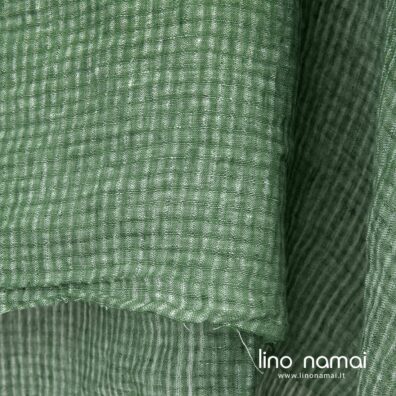 Minkštas švelnus specialiai skalbtas žalias lino audinys permatomais langeliais