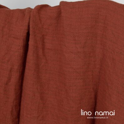 Lininis tvido audinys iš rudai raudonų ir rudų verpalų