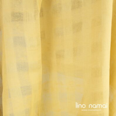 Lininis audinys geltonas ažūriniais langeliais užuolaidoms, šalikams, skaroms, staltiesėms siūti