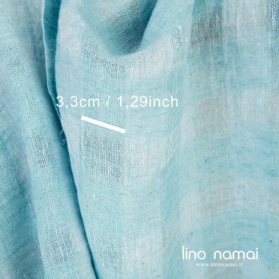 Lininis audinys iš žydros ir šviesios turkio spalvos verpalų