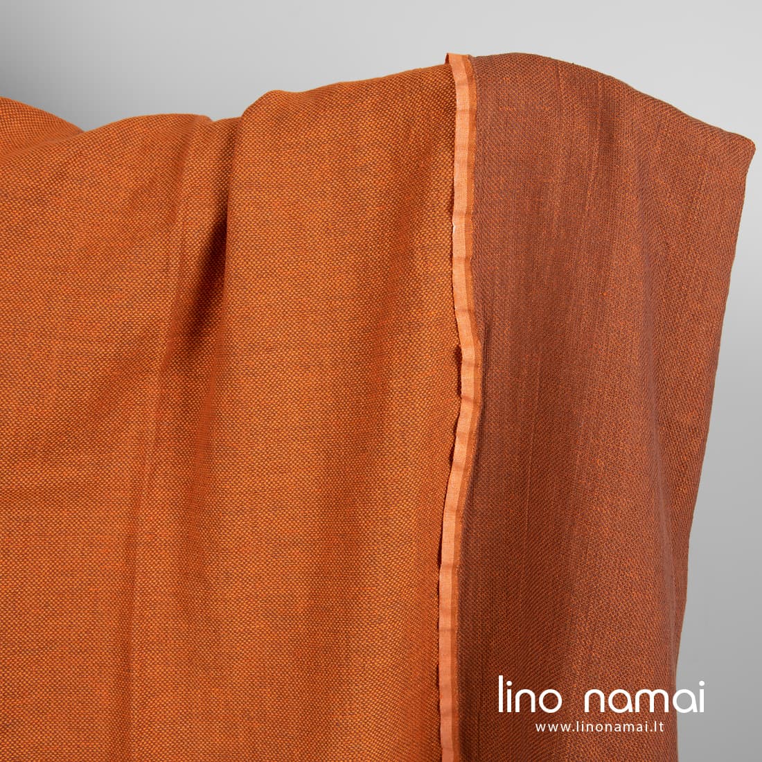 Puslininis audinys oranžinis raštuotas dvipusis skalbtas