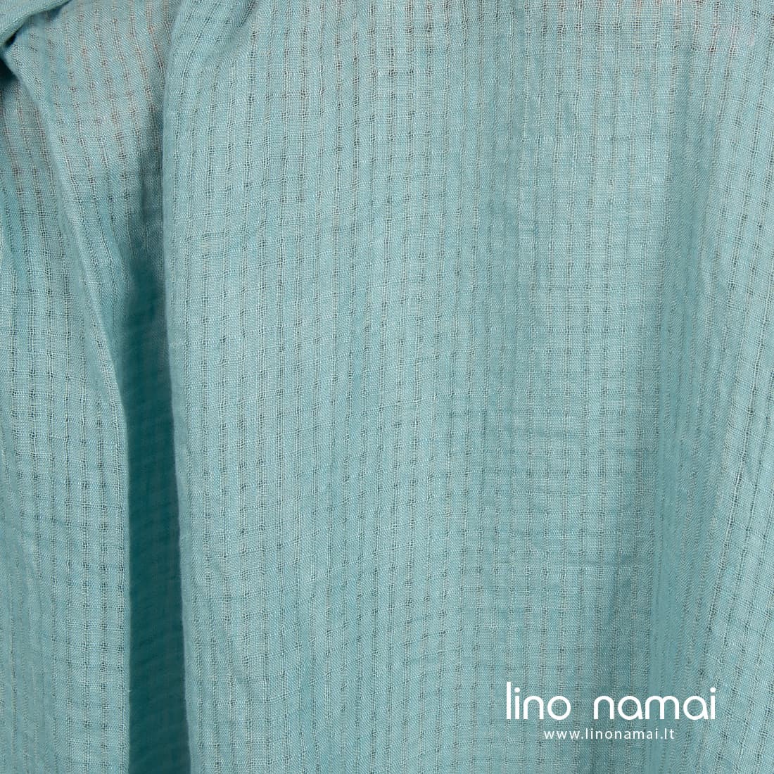 Lininis audinys melsvai žalsvas permatomais langeliais skalbtas minkštas švelnus