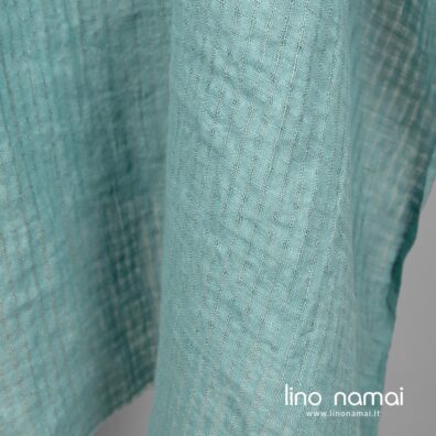 Lininis audinys melsvai žalsvas permatomais langeliais skalbtas tinka lengviems drabužiams, namų tekstilei siūti