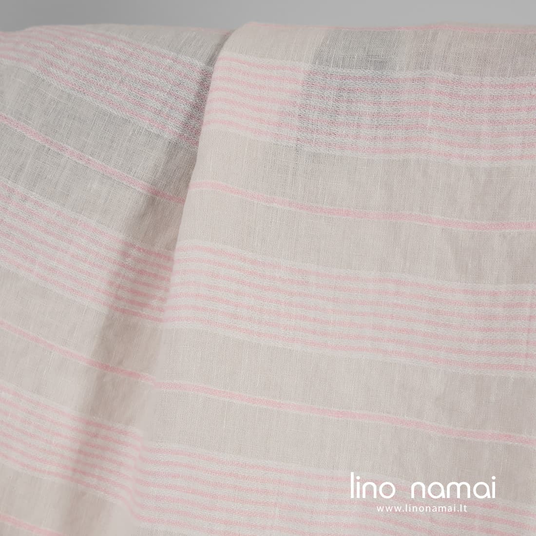 Lininis audinys gelsvas rožinėmis juostelėmis skalbtas minkštas švelnus