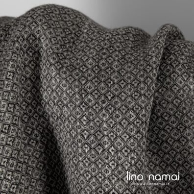 Lino audinys juodai pilkas raštuotas