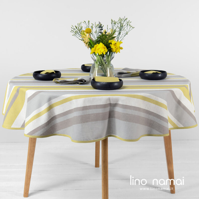 Lininė apvali, ovali staltiesė pilkais - geltonais dryžiais.