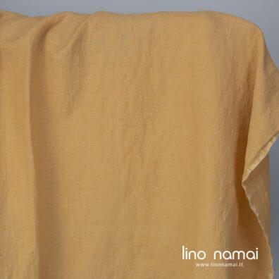 Puslininis audinys geltonai-rusvai raštuotas skalbtas