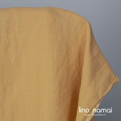 Puslininis audinys geltonai-rusvai raštuotas skalbtas rūbams ir namų tekstilės gaminiams siūti