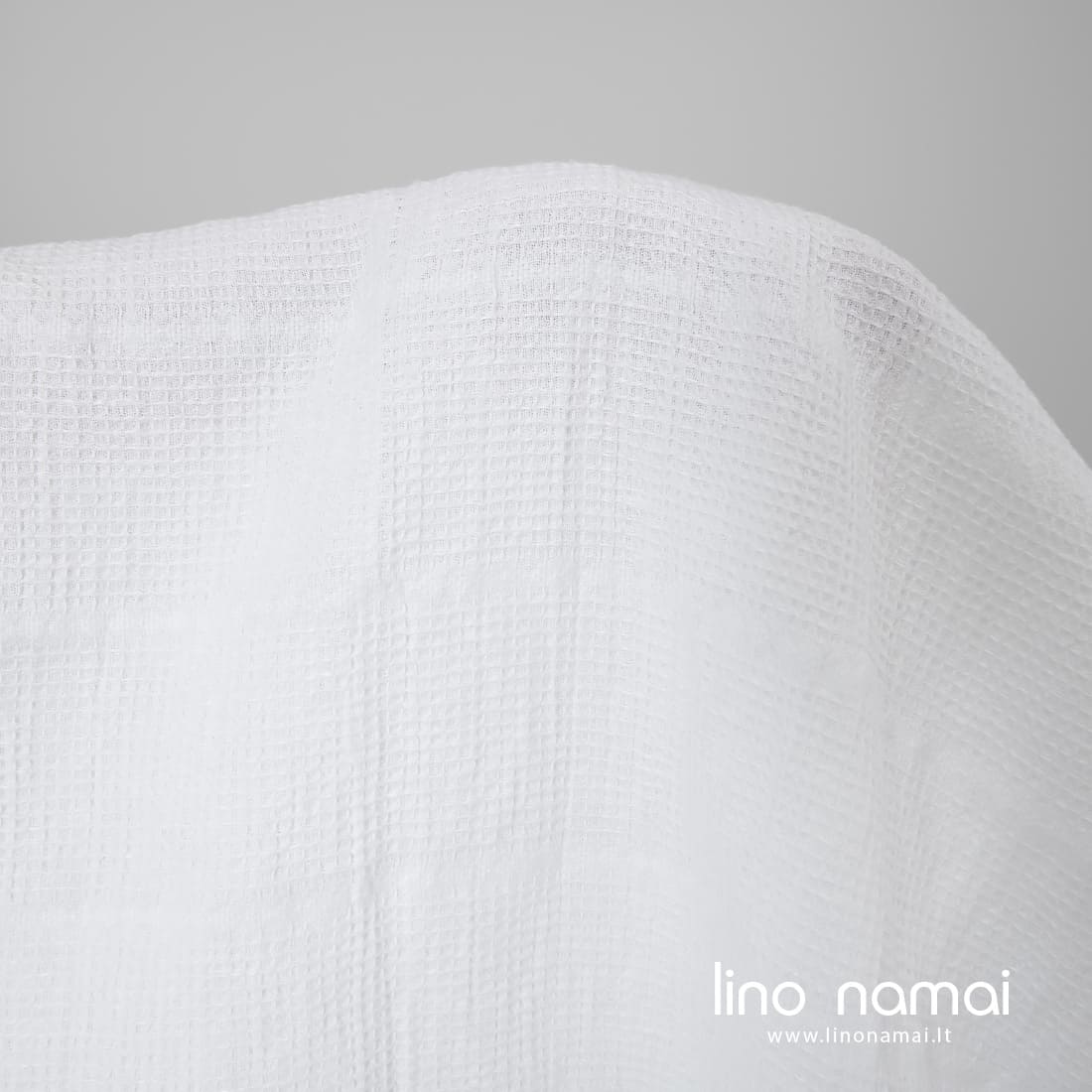 Puslininis audinys ryškiai baltas „vaflinis“ skalbtas tinka rankšluosčiams ir chalatams siūti