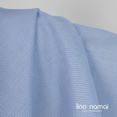 Puslininis audinys šviesiai mėlynas „korio“ raštu