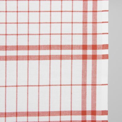 Medvilninis rankšluostinis audinys raudonais langeliais ryškiai baltame fone, 50cm pločio