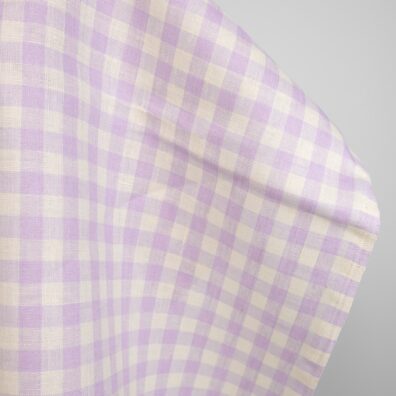 Lininis audinys šviesiai alyviniais langeliais