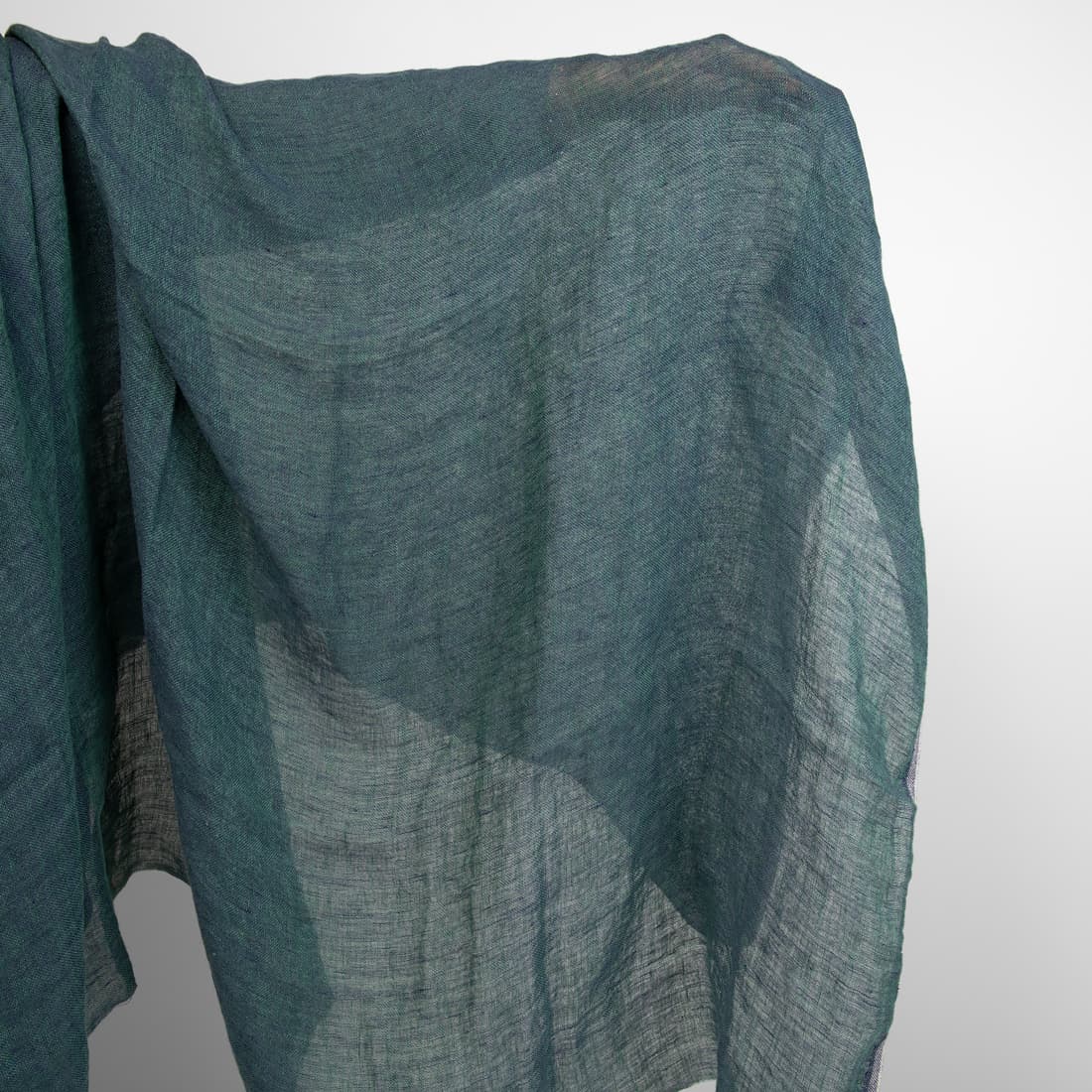 Lininis audinys mėlynai žalias permatomas skalbtas