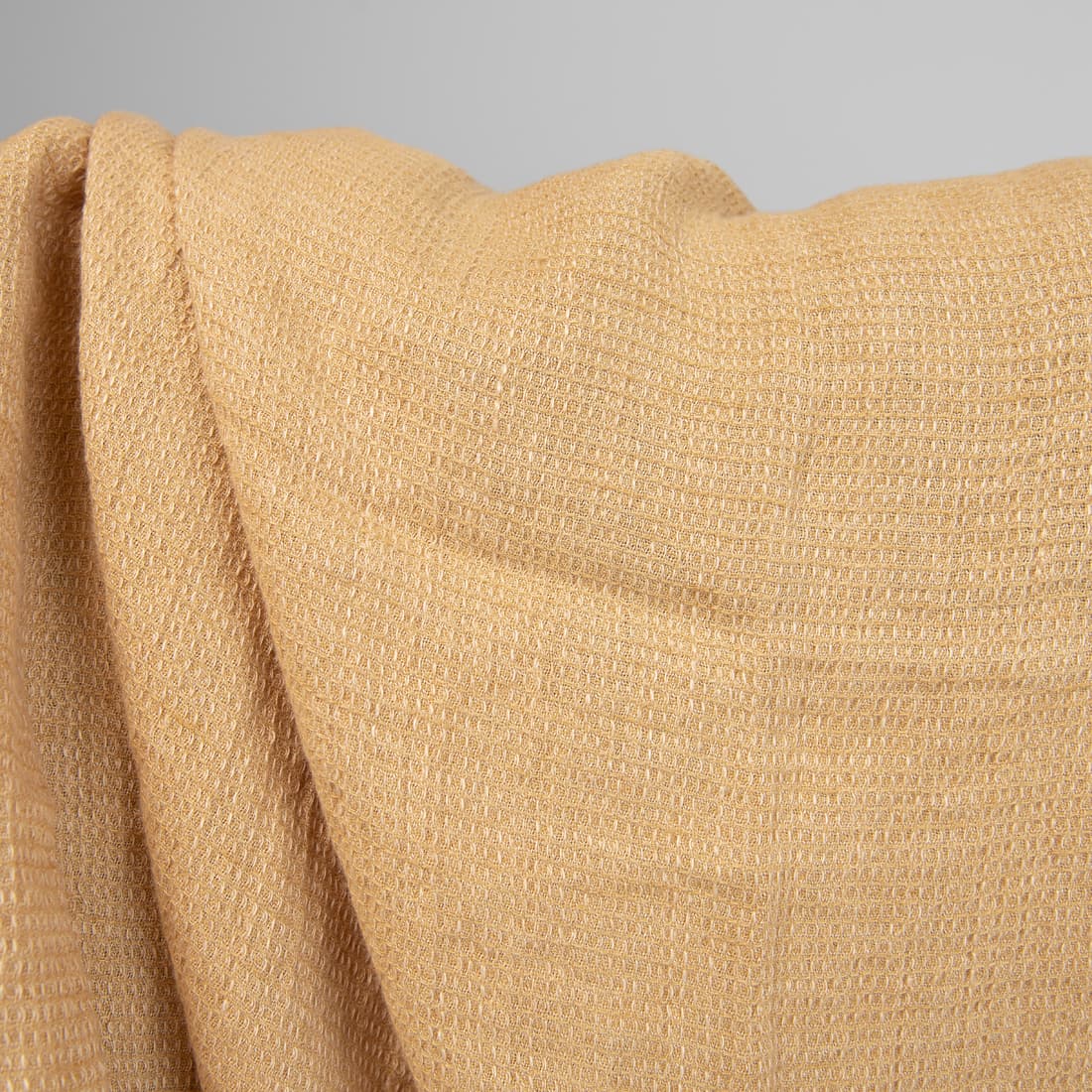 Lininis audinys rusvai gelsvas vaflinis skalbtas minkštas švelnus