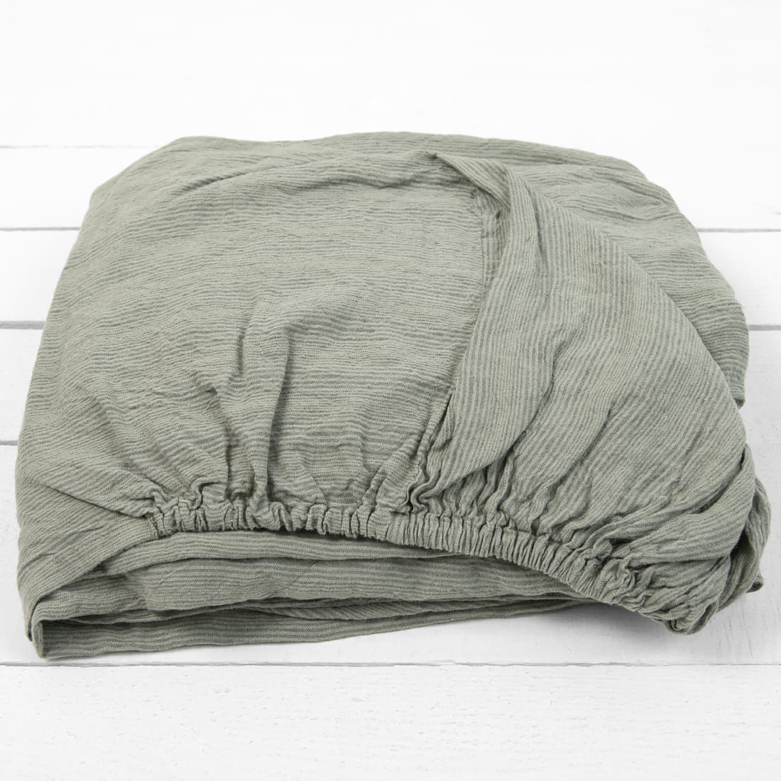 DOVI lininė paklodė žalsva dryžuota su guma