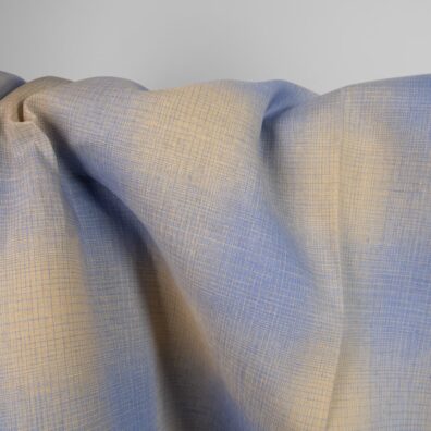 Languotas lininis audinys išaustas iš mėlynų ir gelsvai rusvų verpalų, melanžas su spalvų perėjimu