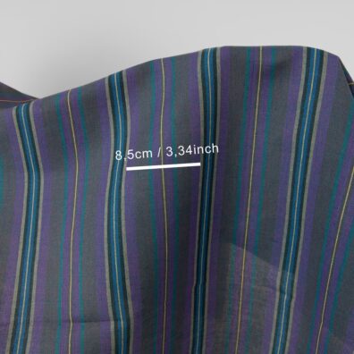 Lino - medvilnės audinys dryžuotas, kuriame suausti suausti geltoni, tamsiai violetiniai, mėlynai violetiniai, tamsios turkio spalvos, pilkšvi, juodi ir mėlyni verpalai