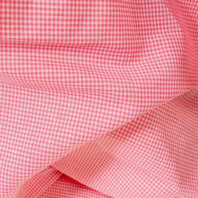 Lino - medvilnės audinys ryškiai rožiniais langeliais tinka drabužiams ir namų tekstilei siūti