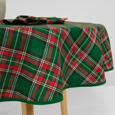 Žalia apvali (ovali) staltiesė su raudonais langeliais ir ryškiai žaliu kanteliu aplink