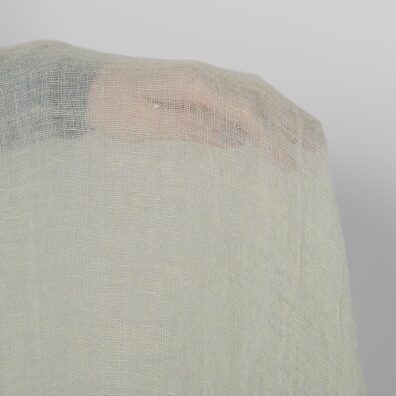 Lininis audinys pilkšvai žalsvas permatomas skalbtas minkštas švelnus
