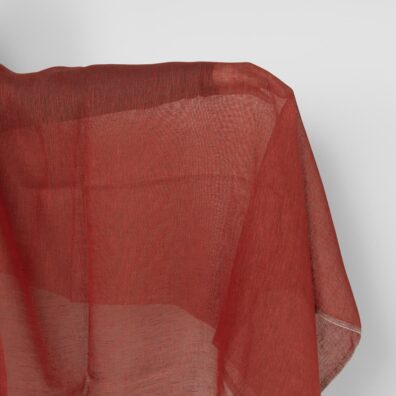 Lininis audinys rudai raudonas permatomas