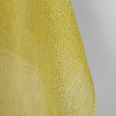 Lininis audinys žaliai geltonas permatomas tinka užuolaidoms ir šalikams siūti