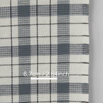 Puslininis rankšluostinis audinys pilkais ir baltais langeliais „vaflinis“ 50cm pločio