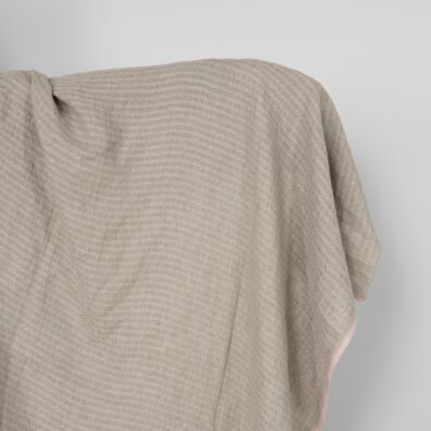 Lino audinys alyviniu-žaliu rombų raštu skalbtas