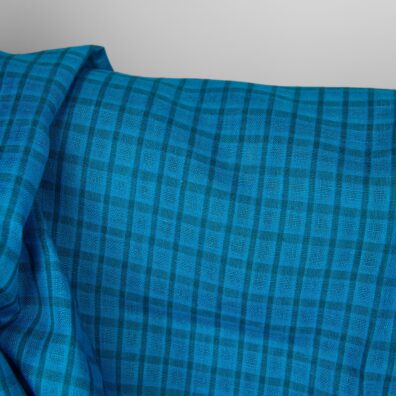 Lininis audinys mėlynas permatomais ir tankesnio pynimo langeliais