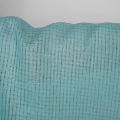 Lininis audinys turkio spalvos permatomais langeliais tinka drabužiams ir namų tekstilės gaminiams siūti