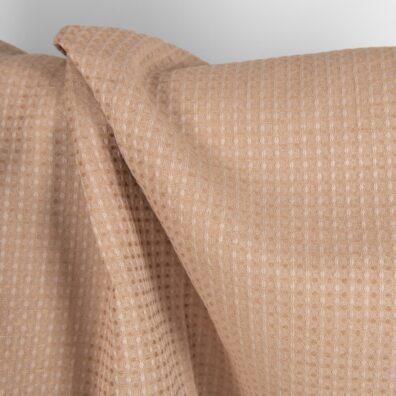 Puslininis audinys šviesiai rudas „vaflinis“ tinka vonios rankšluosčiams, chalatams siūti