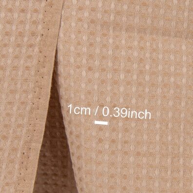 Lino - medvilnės audinys šviesiai rudas „vaflinis“ yra tvirtas, tankus, tinka vonios rankšluosčiams, chalatams siūti.