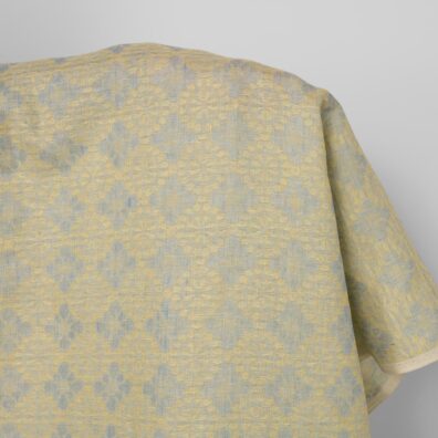 Lininis audinys melsvai geltonu raštu tinka drabužiams ir namų tekstilės gaminiams siūti