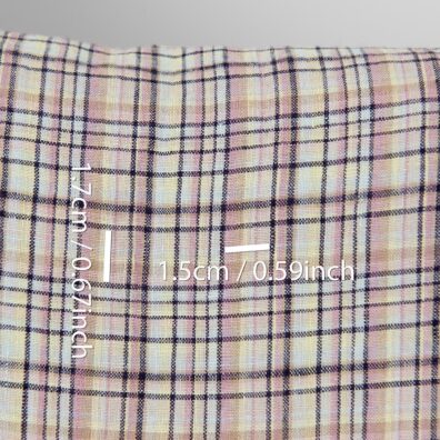 Lininis audinys įvairiaspalviais pasteliniais ir tamsiai mėlynais langeliais, skalbtas