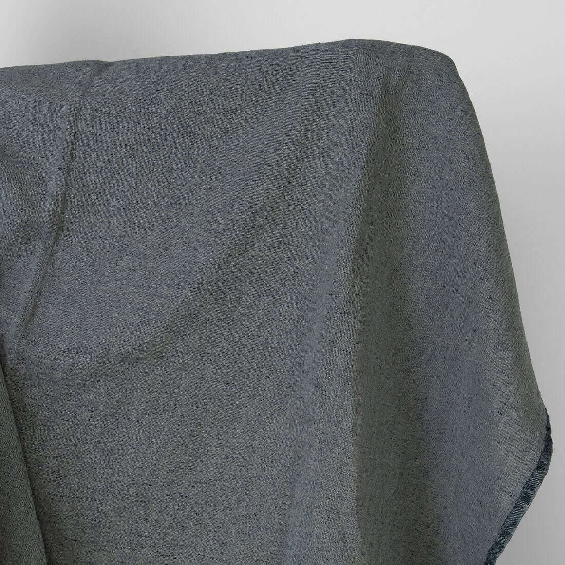 Puslininis audinys žalsvas-tamsiai mėlynas melanžinis skalbtas