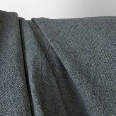 Puslininis audinys žalsvas-tamsiai mėlynas melanžinis skalbtas tinka drabužiams ir namų tekstilės gaminiams siūti