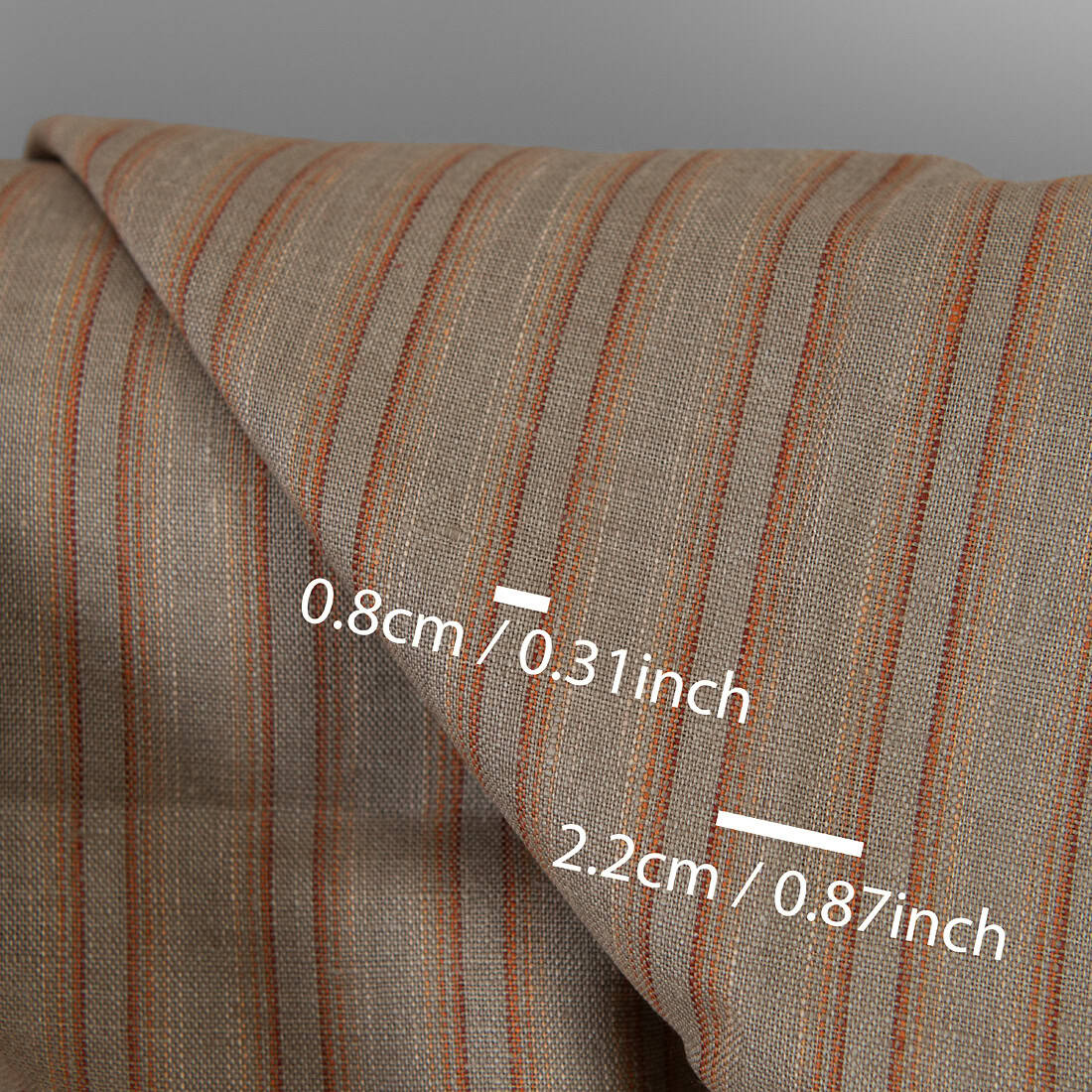 Lininis audinys oranžiniais ir rudais dryžiais tinka drabužiams ir namų tekstilės gaminiams siūti