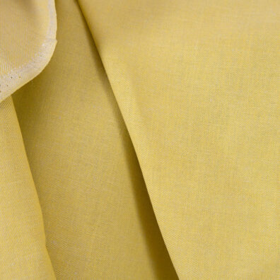 Puslininis audinys geltonas-pilkas dvipusis tinka drabužiams ir namų tekstilės gaminiams siūti