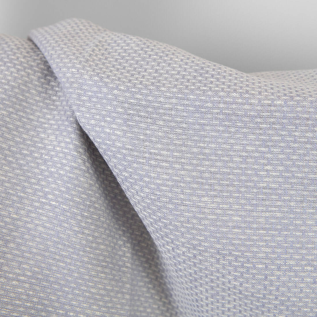 Lino-vilnos audinys šviesiai violetinis raštuotas tinka drabužiams, aksesuarams, namų tekstilei siūti