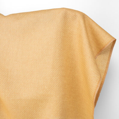 Lininis audinys gelsvos ir degto molio taškuotas