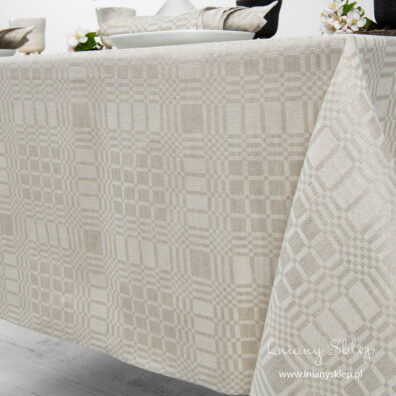 Lniano - bawełniany obrus w kratkę. Gładko podwinięty brzeg.