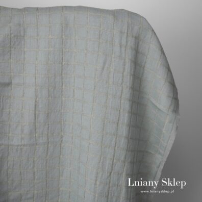 Prana szaro-niebieska tkanina w kratkę.