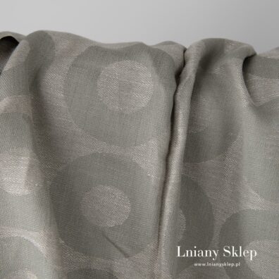 Gęsta, średnio gęsta ciężka szara tkanina żakardowa.